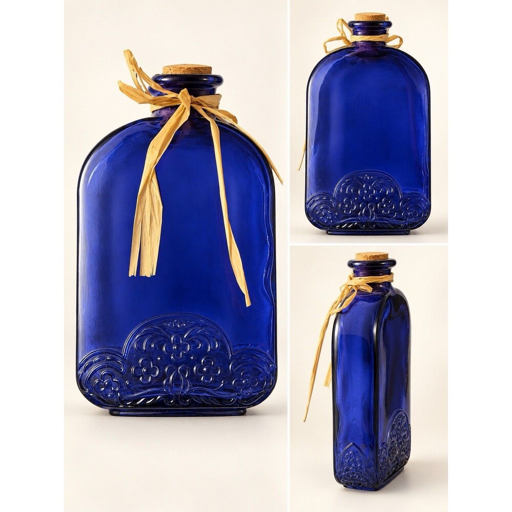 Vintage Cobalt Blue Embossed Glass Bottle